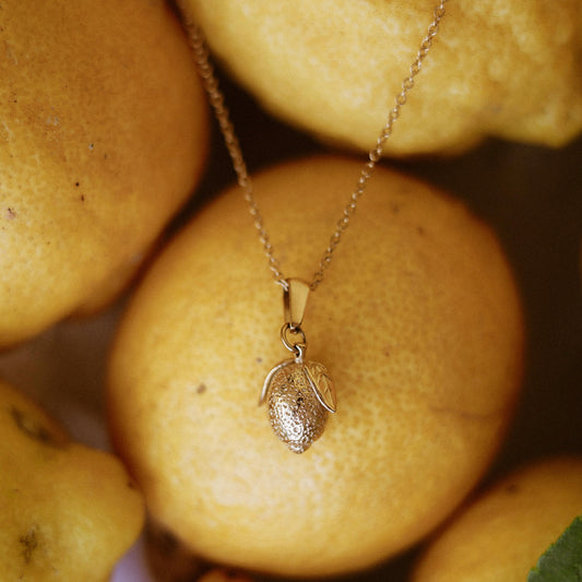 Lemon necklace on lemons
