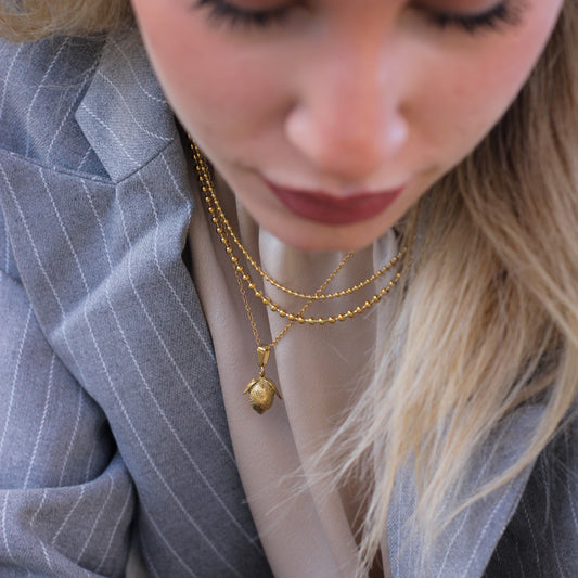 Filigree lemon necklace made from high-quality stainless steel - stylish accessory.